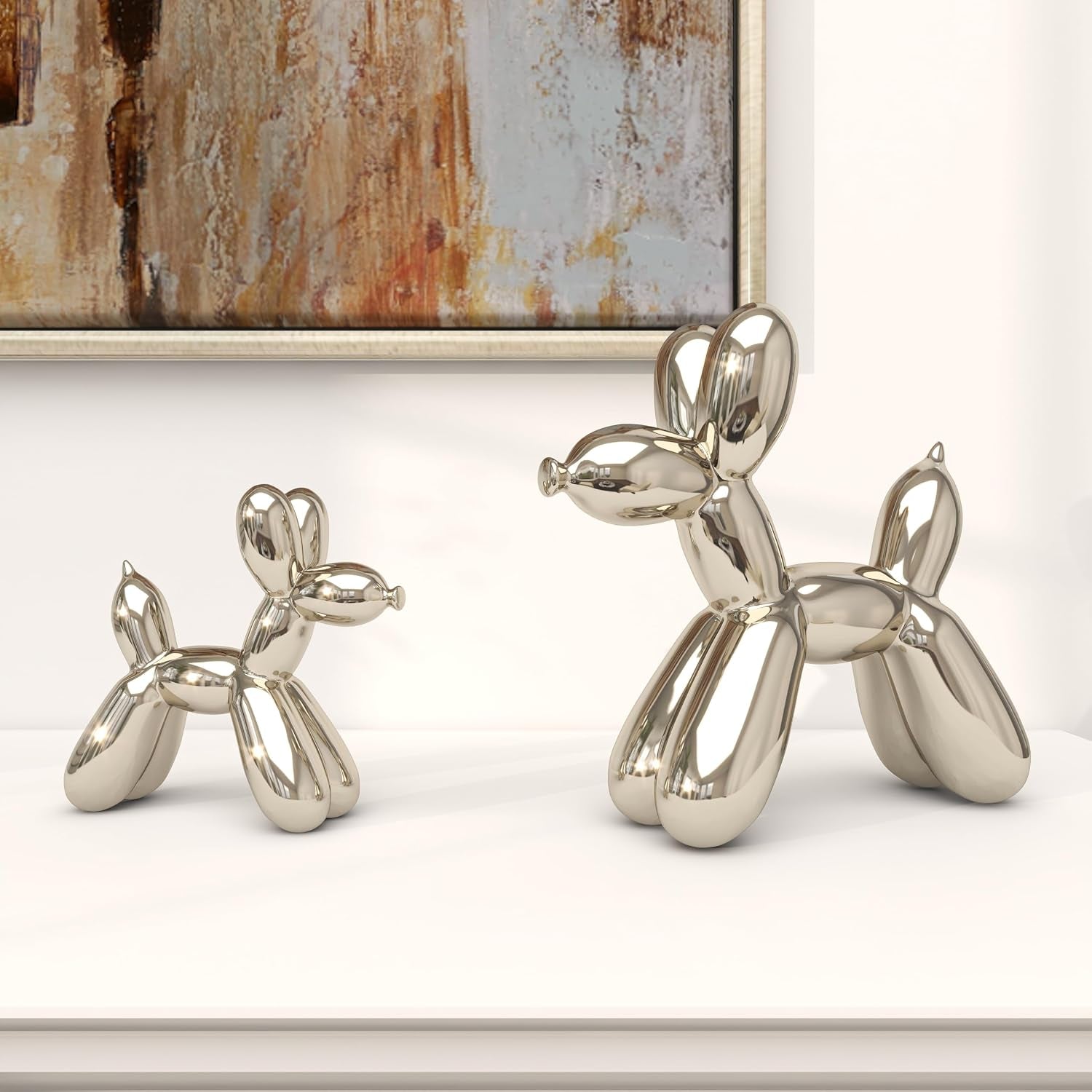 Deco 79 Porcelain Ceramic Dog Sculpture, Set of 2 Sculpture 9", 7"H, Silver | Decorative Dog Animals Balloon Home Decor Statues Statue Figurine